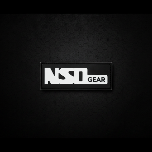 Rectangular black patch with 'NSN GEAR' text on a white background