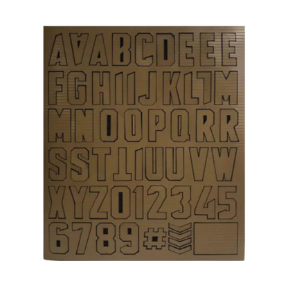 Sheet of laser-cut letters and numbers on a white background