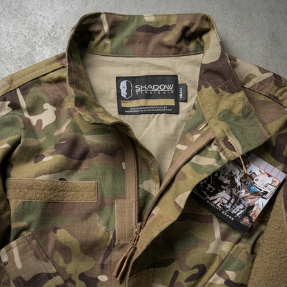 Camouflage jacket with a brand label on a gray background