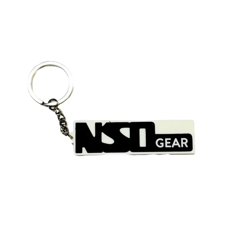Keychain with 'NST Gear' logo on a white background