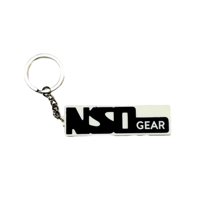 Keychain with 'NST Gear' logo on a white background