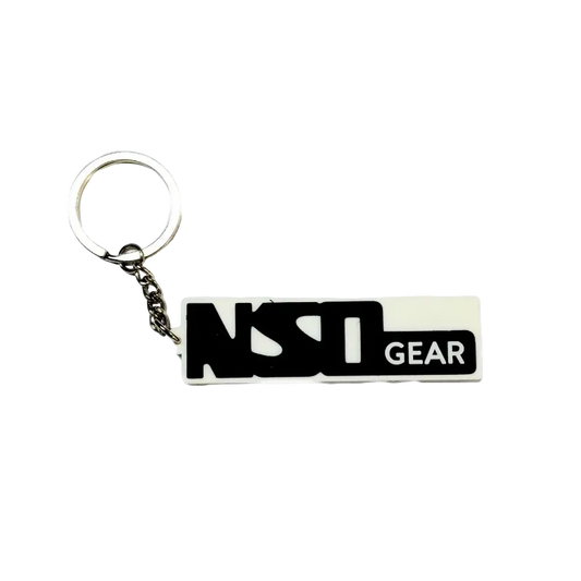 Keychain with 'NST Gear' logo on a white background