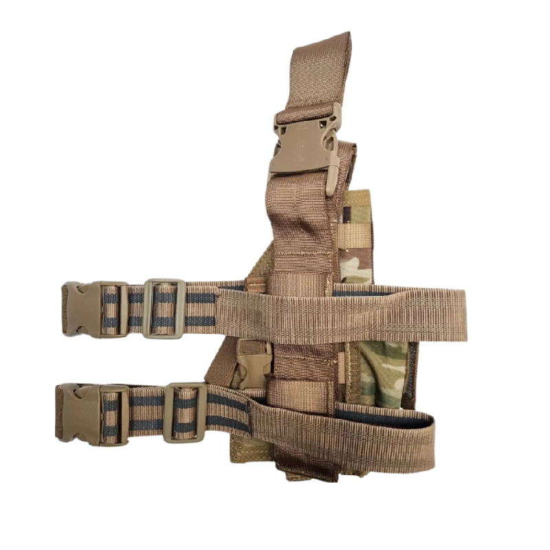 Tactical holster with multiple straps on a white background