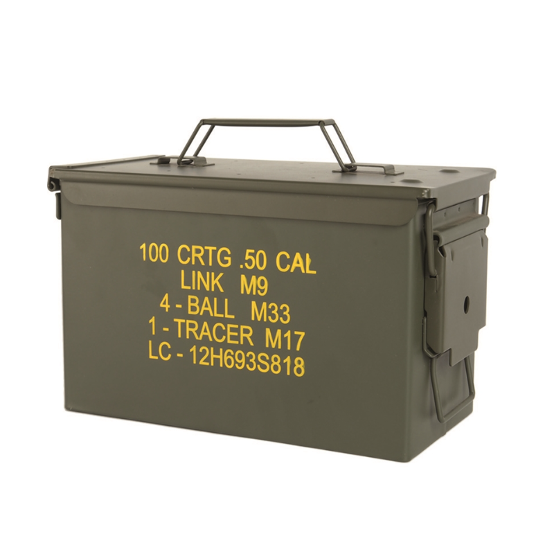 An olive drab military-style ammo box with yellow printed text on the side, a metal carry handle on top, and a latch closure on the right, shown on a plain white background.