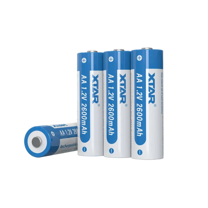 Four Xtar AA batteries with blue and white labels on a white background