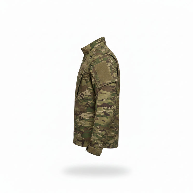 Man in camouflage jacket standing in a store with tactical gear on display