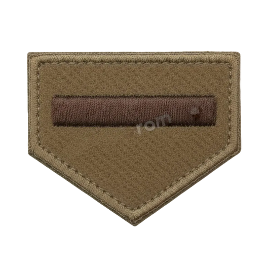 Brown patch with a rectangular brown bar on a white background